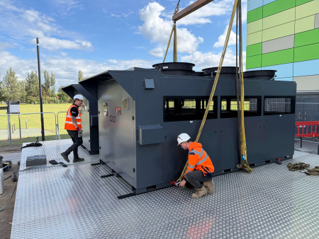Men completing installation of a modular build on Jackpad foundation pads