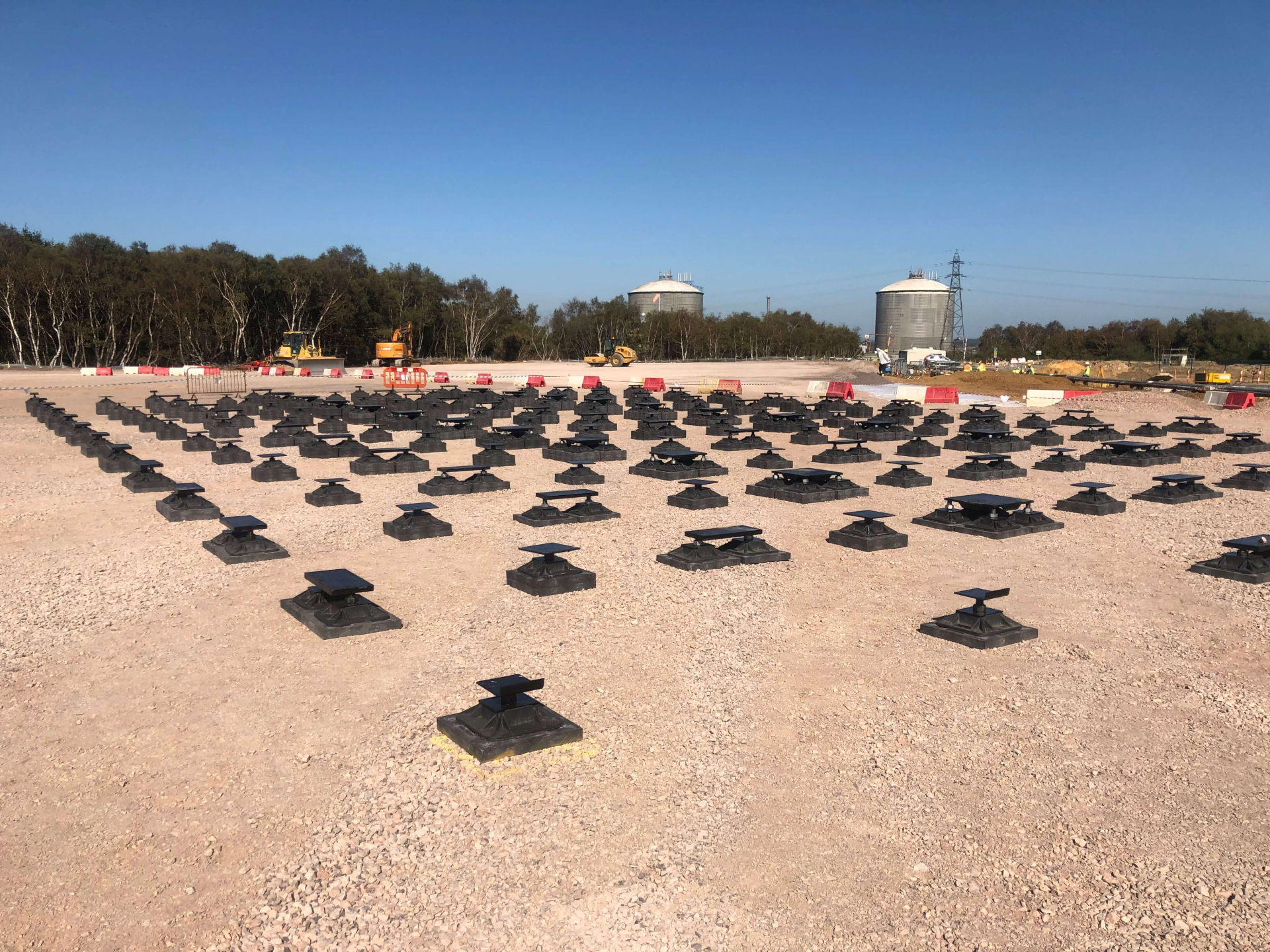 Jackpad modular foundation system for a construction site